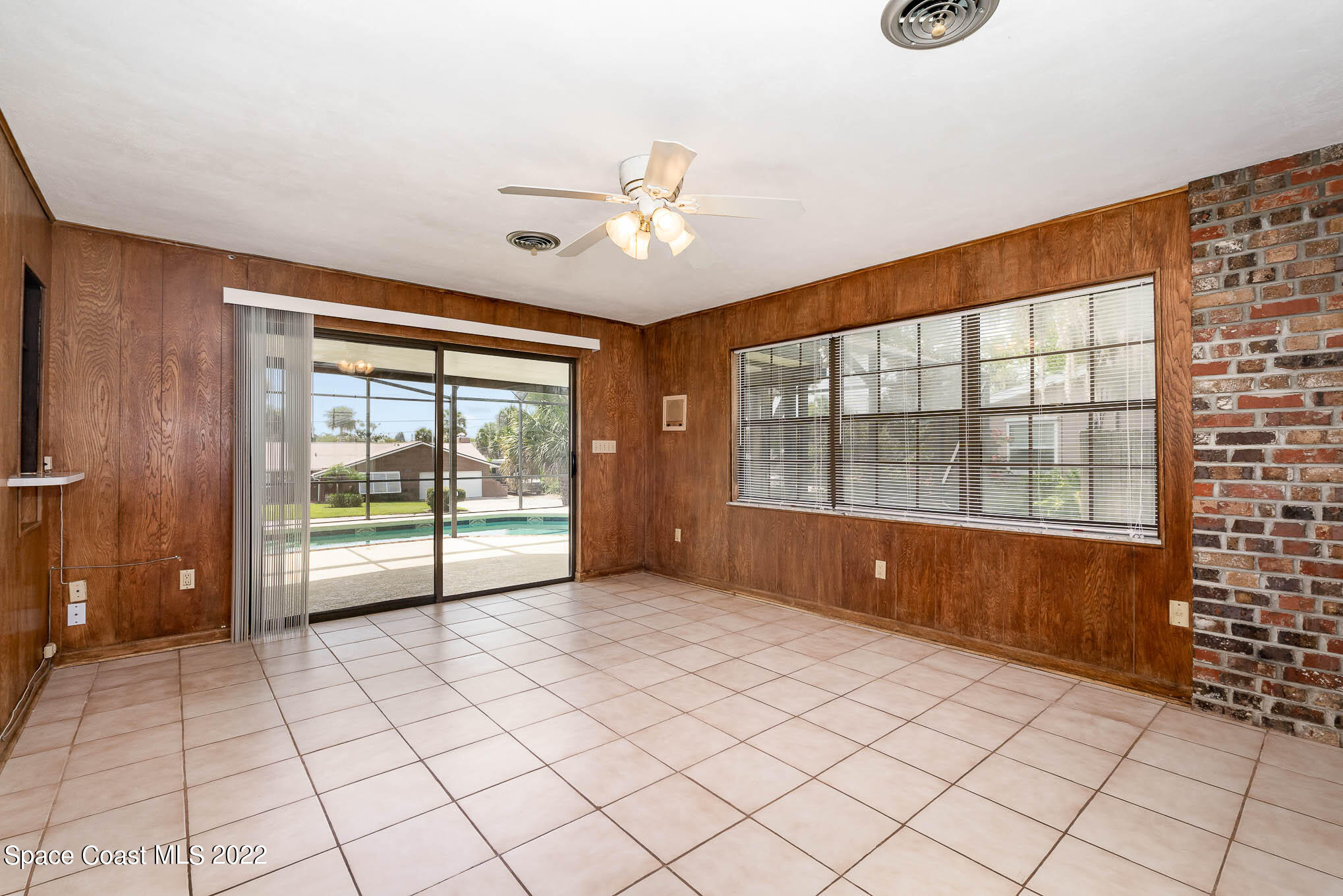 2676 Lemon Street Northeast Palm Bay, FL 32905 - Photo 12 of 35 a view of an empty room with a window