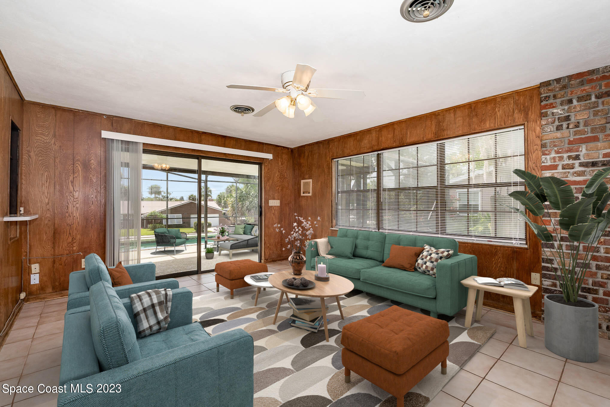 2676 Lemon Street Northeast Palm Bay, FL 32905 - Photo 13 of 35 a living room with furniture and a large window