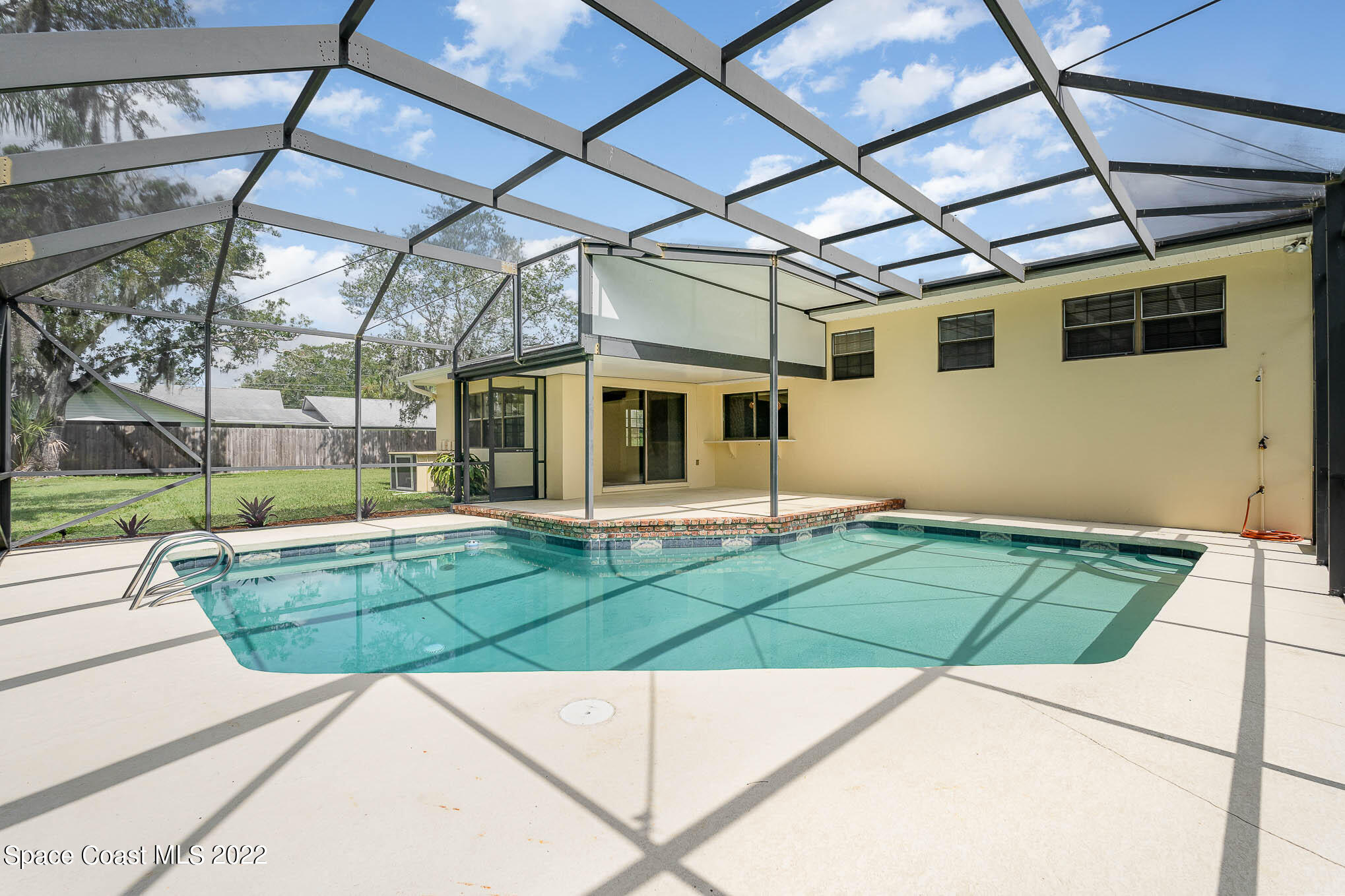 2676 Lemon Street Northeast Palm Bay, FL 32905 - Photo 14 of 35 a view of a backyard of the house