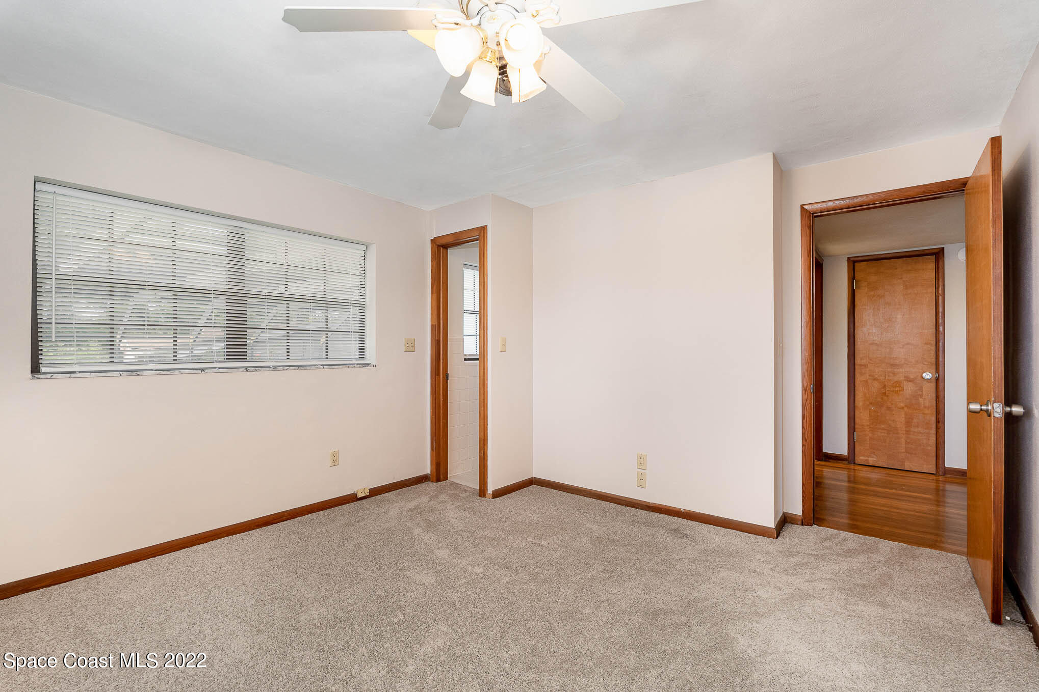 2676 Lemon Street Northeast Palm Bay, FL 32905 - Photo 17 of 35 an empty room with a window