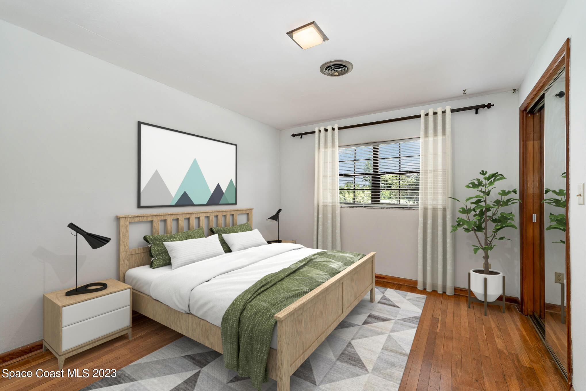 2676 Lemon Street Northeast Palm Bay, FL 32905 - Photo 24 of 35 a bedroom with a bed and a large window