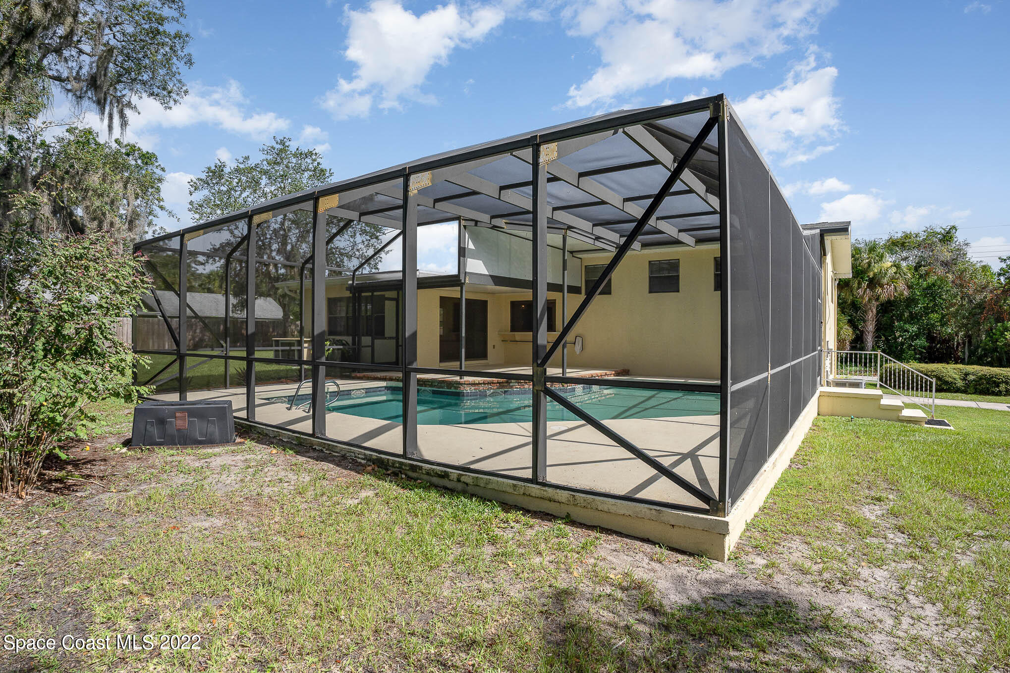 2676 Lemon Street Northeast Palm Bay, FL 32905 - Photo 31 of 35 a view of staircase with a garden