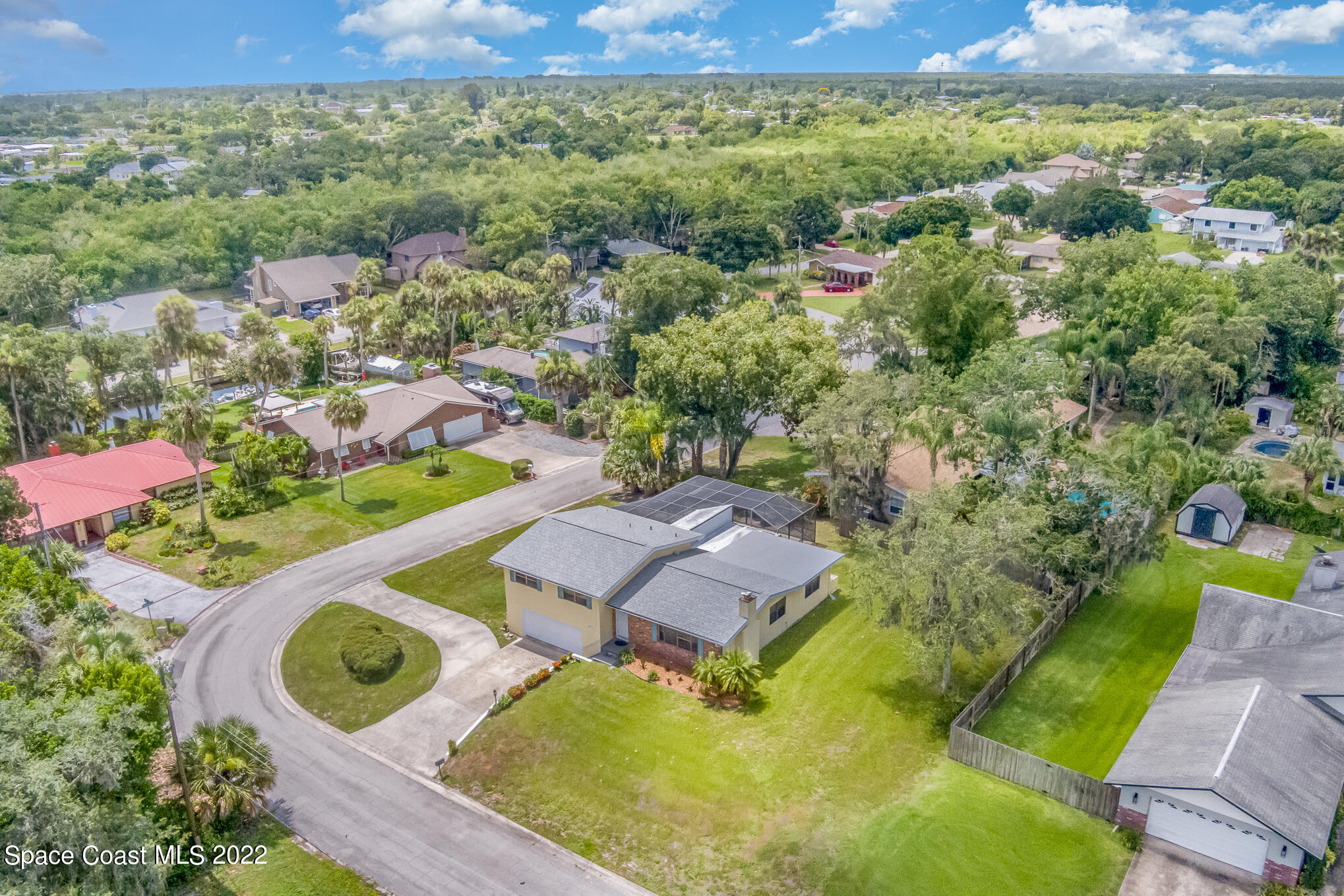 2676 Lemon Street Northeast Palm Bay, FL 32905 - Photo 33 of 35 an aerial view of house with yard