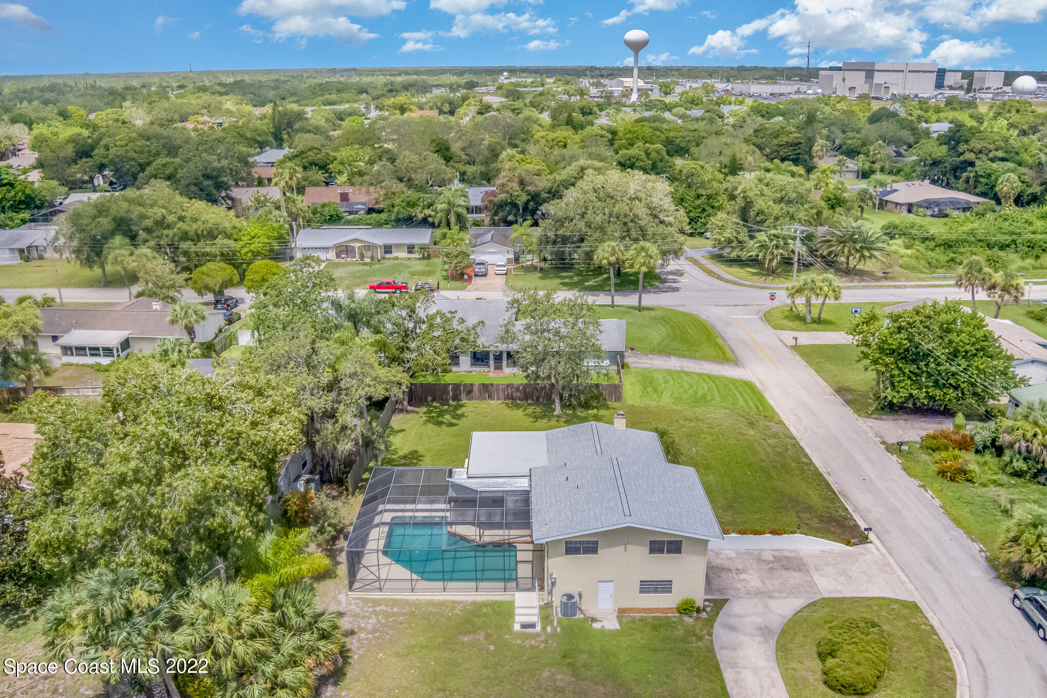 2676 Lemon Street Northeast Palm Bay, FL 32905 - Photo 34 of 35 an aerial view of a house with a garden