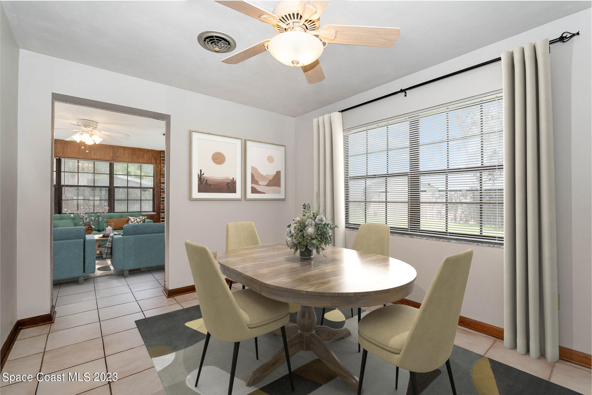2676 Lemon Street Northeast Palm Bay, FL 32905 - Photo 10 of 35 a view of a dining room with furniture and window