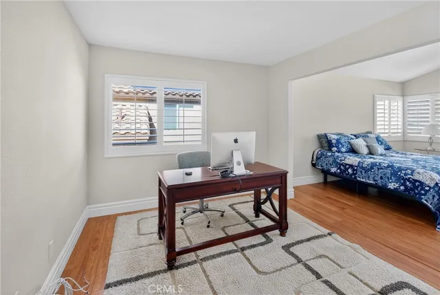 a workspace with furniture and window