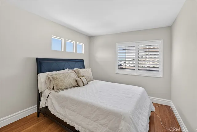 a front view of a house with garden and porch