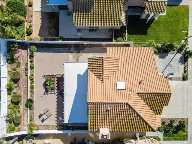 a living room with furniture or wooden floor and a chandelier