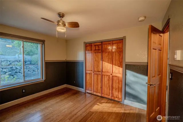 wooden floor and window in an empty room