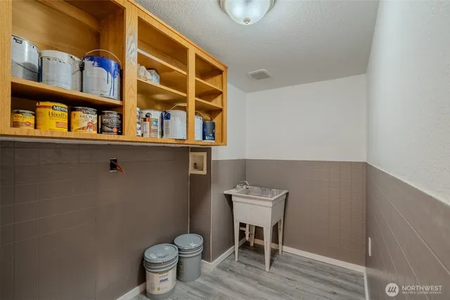 a bathroom with a toilet and a sink