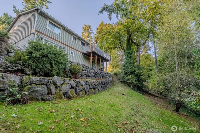 a backyard of a house with lots of green space