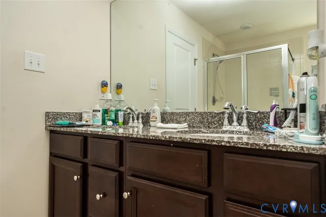 a bedroom with bed and a dresser