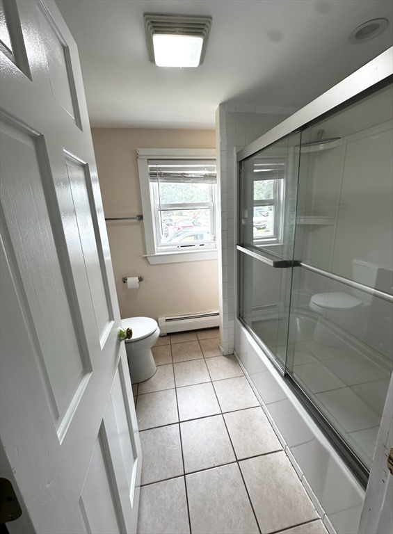 18 Boston Street, Unit RIGHT SIDE Middleton, MA 01949 - Photo 3 of 7 a bathroom with a toilet a sink and shower
