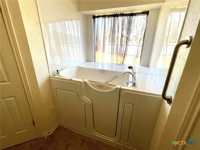 a bathroom with a sink and a tub