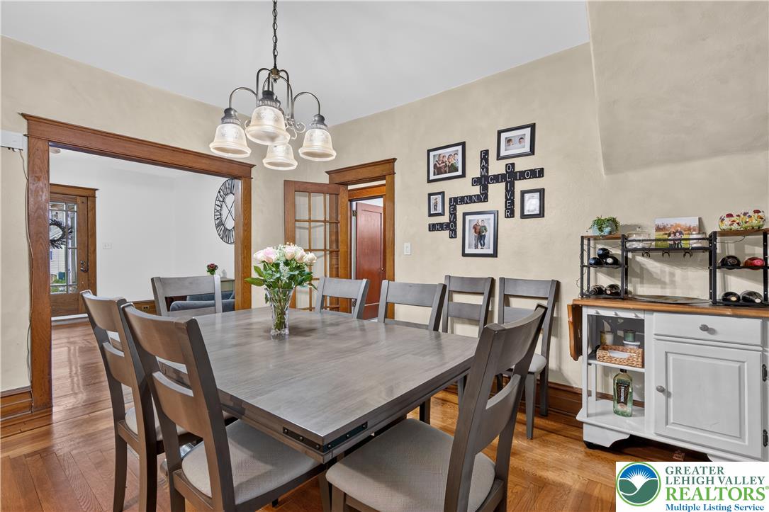 534 Ridge Street Emmaus, PA 18049 - Photo 11 of 40 a view of a dining room with furniture and a chandelier