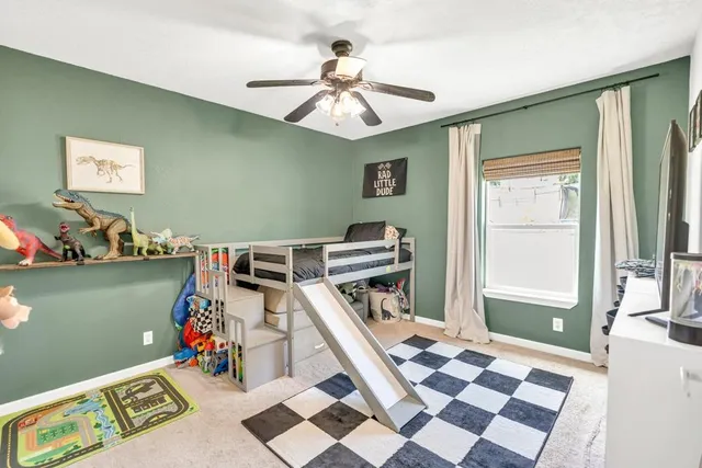 a workspace with furniture and window