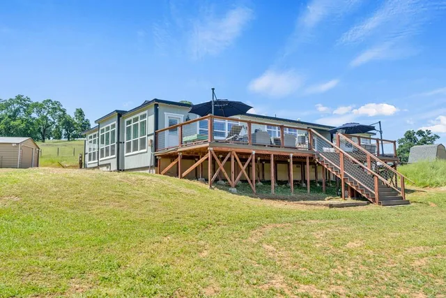 a view of a pool in a yard