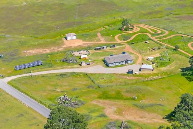 a view of a lake with a house in the background