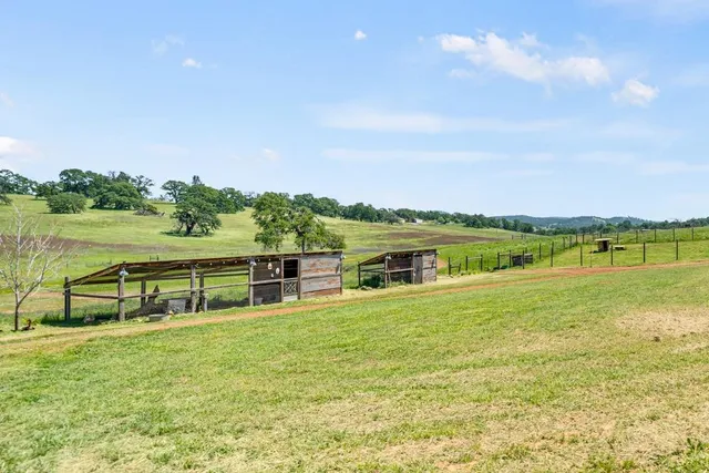 a view of a lake with a yard