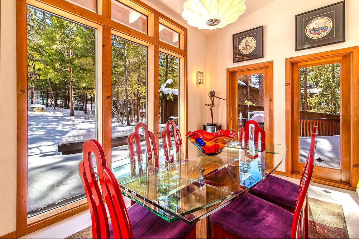 25440 Seneca Road Idyllwild, CA 92549 - Photo 16 of 68 a view of a dining room with furniture water view and backyard of the house
