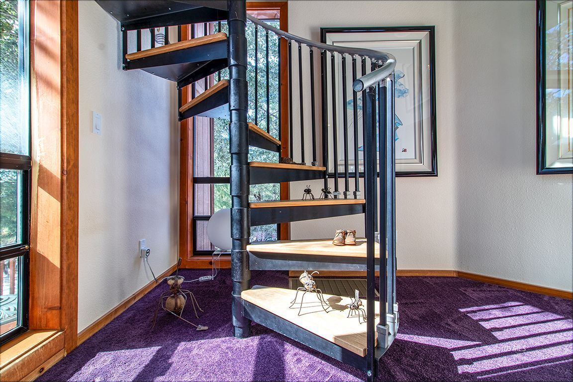 25440 Seneca Road Idyllwild, CA 92549 - Photo 24 of 68 a view of staircase with wooden floor and a window