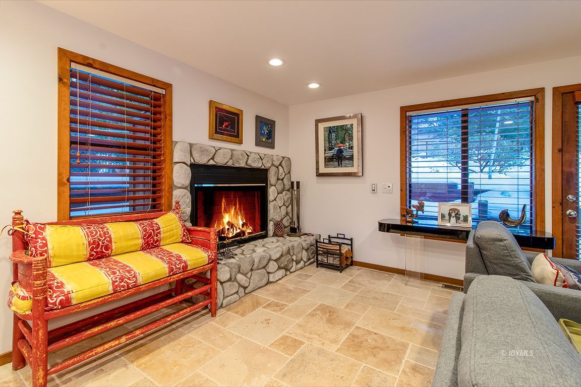 25440 Seneca Road Idyllwild, CA 92549 - Photo 28 of 68 a living room with furniture and a fireplace