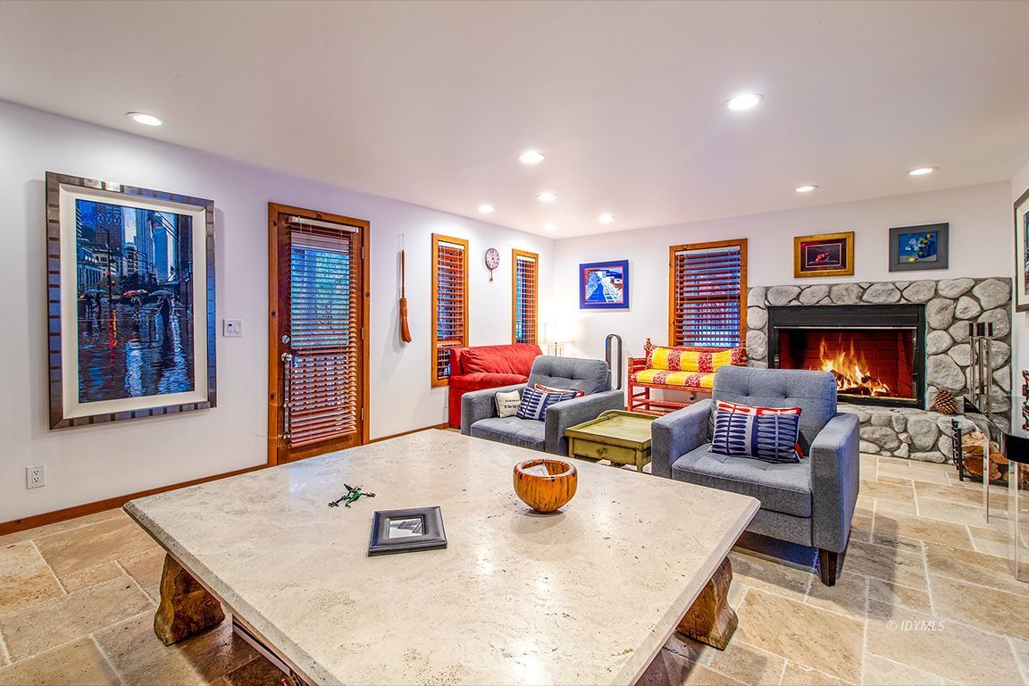 25440 Seneca Road Idyllwild, CA 92549 - Photo 53 of 68 a living room with furniture and a fireplace