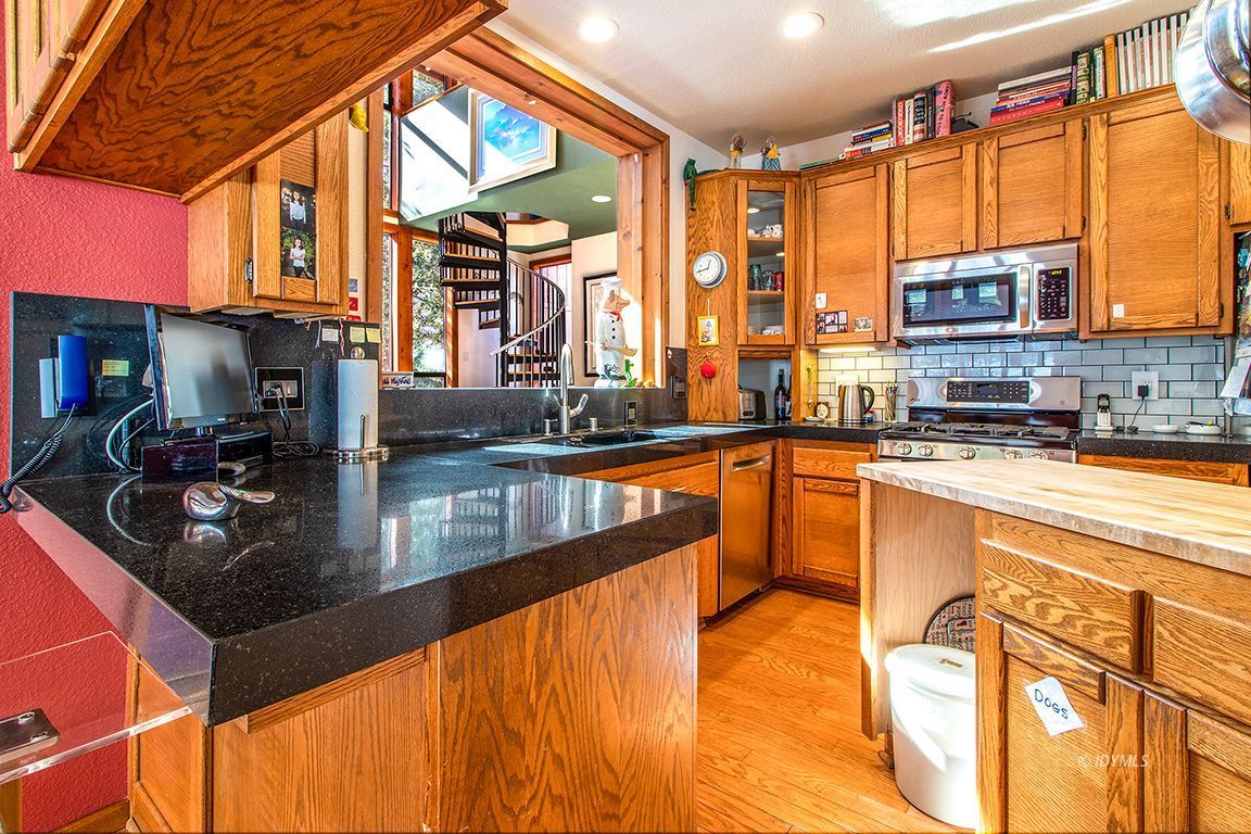 25440 Seneca Road Idyllwild, CA 92549 - Photo 10 of 68 a kitchen with stainless steel appliances granite countertop a sink and a counter space