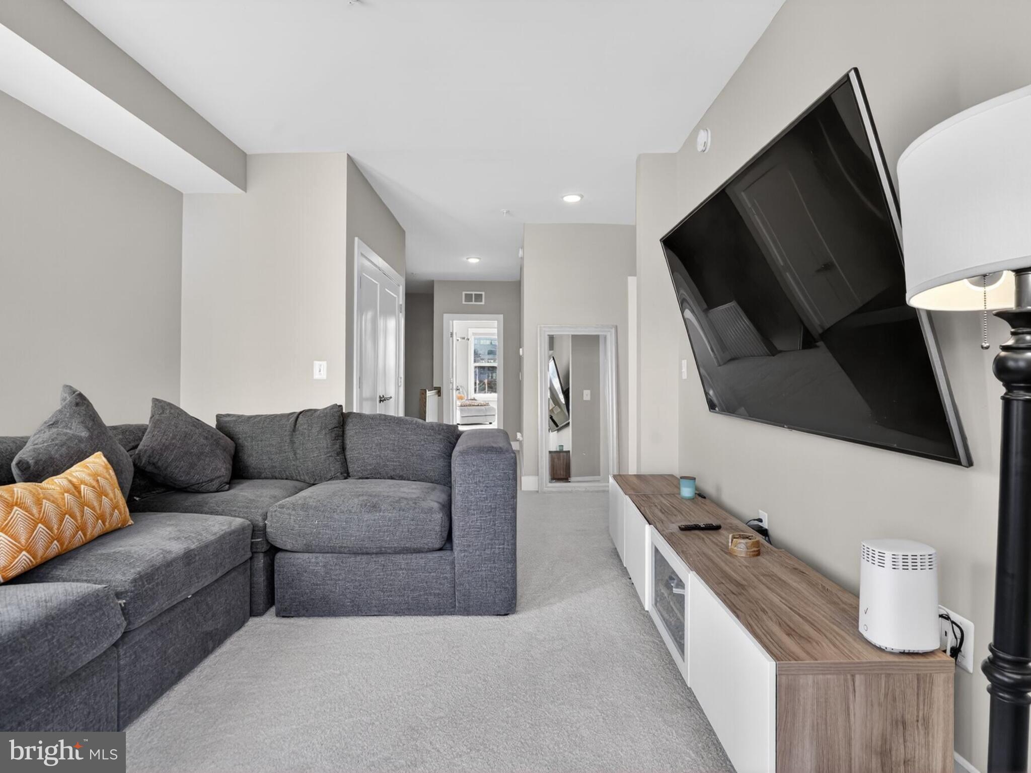 55 Silverway Drive, Unit 48 Herndon, VA 20170 - Photo 15 of 31 Re-Entering the Loft from Balcony