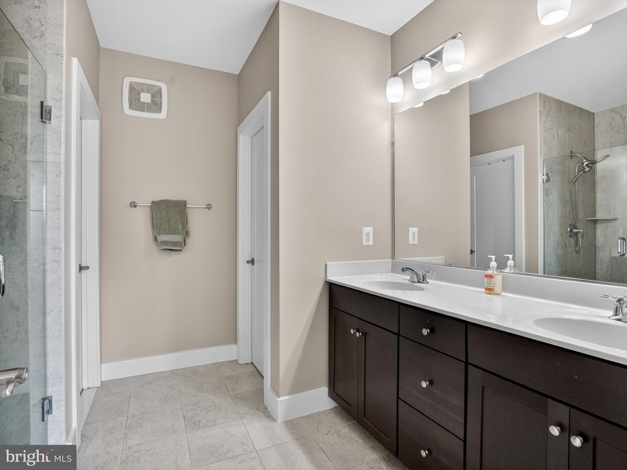 55 Silverway Drive, Unit 48 Herndon, VA 20170 - Photo 26 of 31 Primary Bathroom is Where You Find 1 of 2 Closets