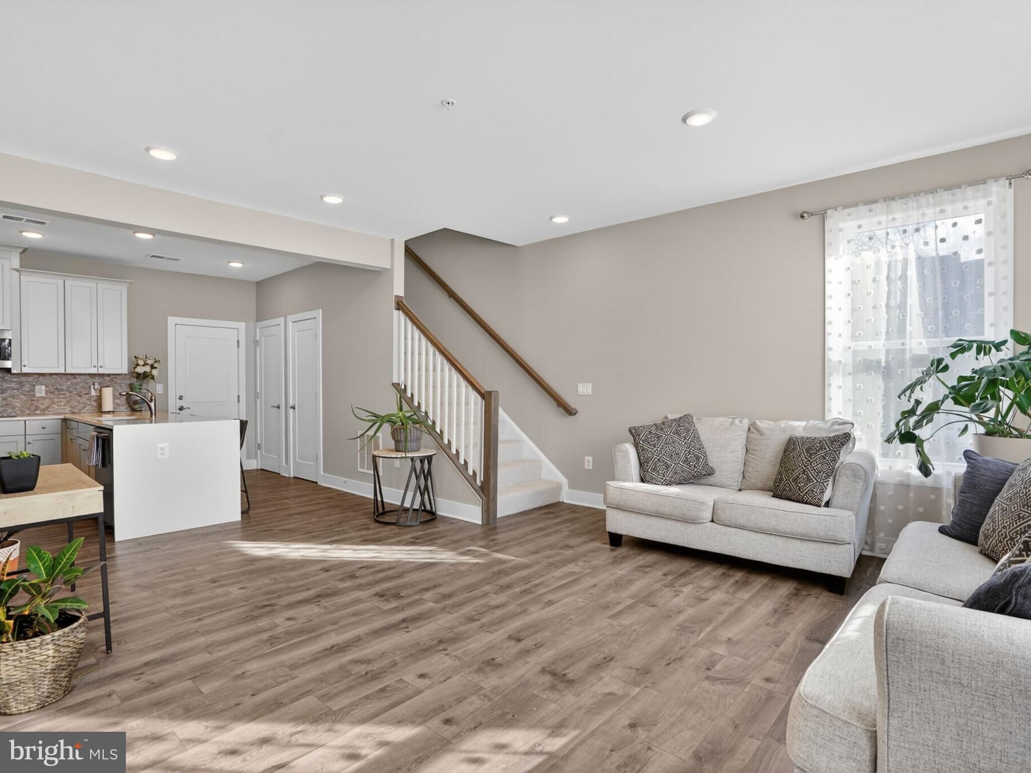 55 Silverway Drive, Unit 48 Herndon, VA 20170 - Photo 3 of 31 Main Level Entry to Living Room