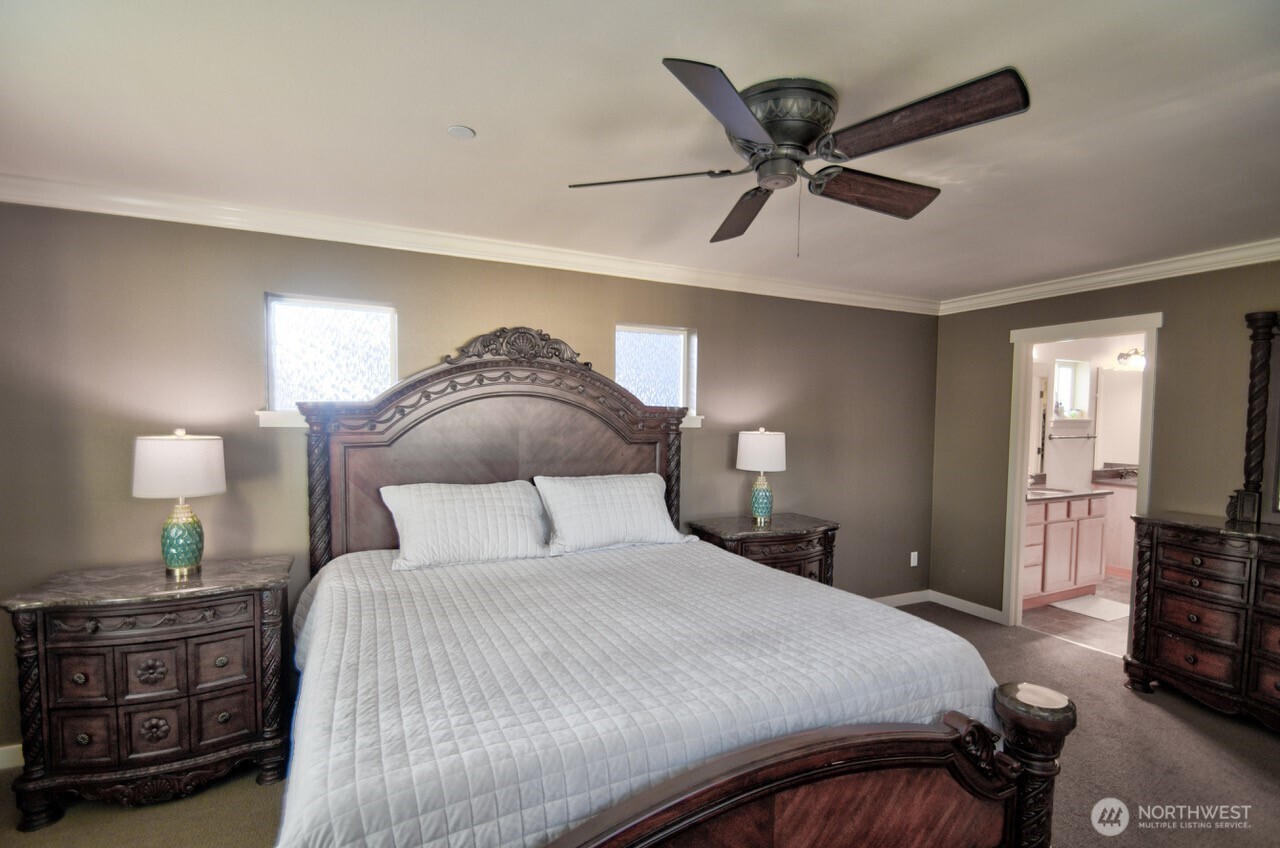 3172 Sheaser Way DuPont, WA 98327 - Photo 15 of 34 a bedroom with a bed and window