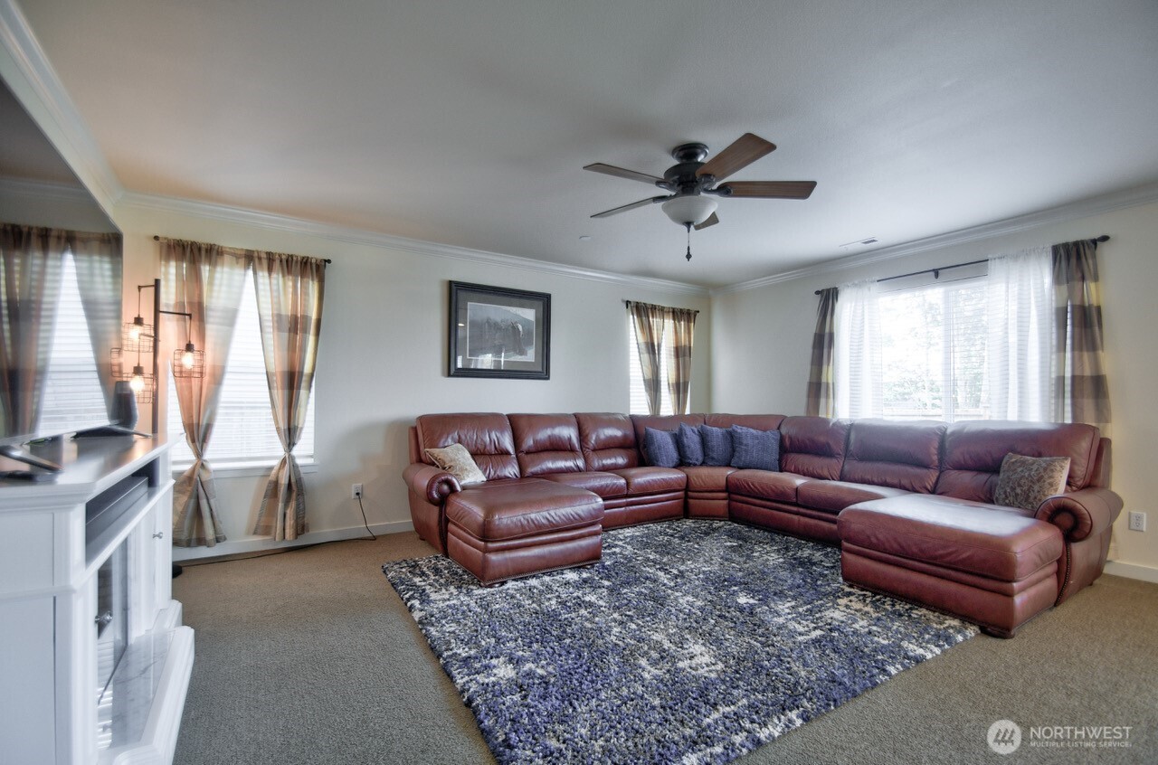 3172 Sheaser Way DuPont, WA 98327 - Photo 5 of 34 a living room with furniture and a window