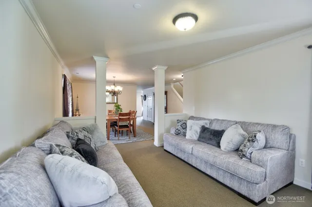 a living room with furniture and a couch