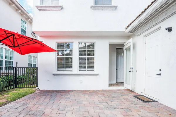 a view of outdoor space with swimming pool and lounge chair