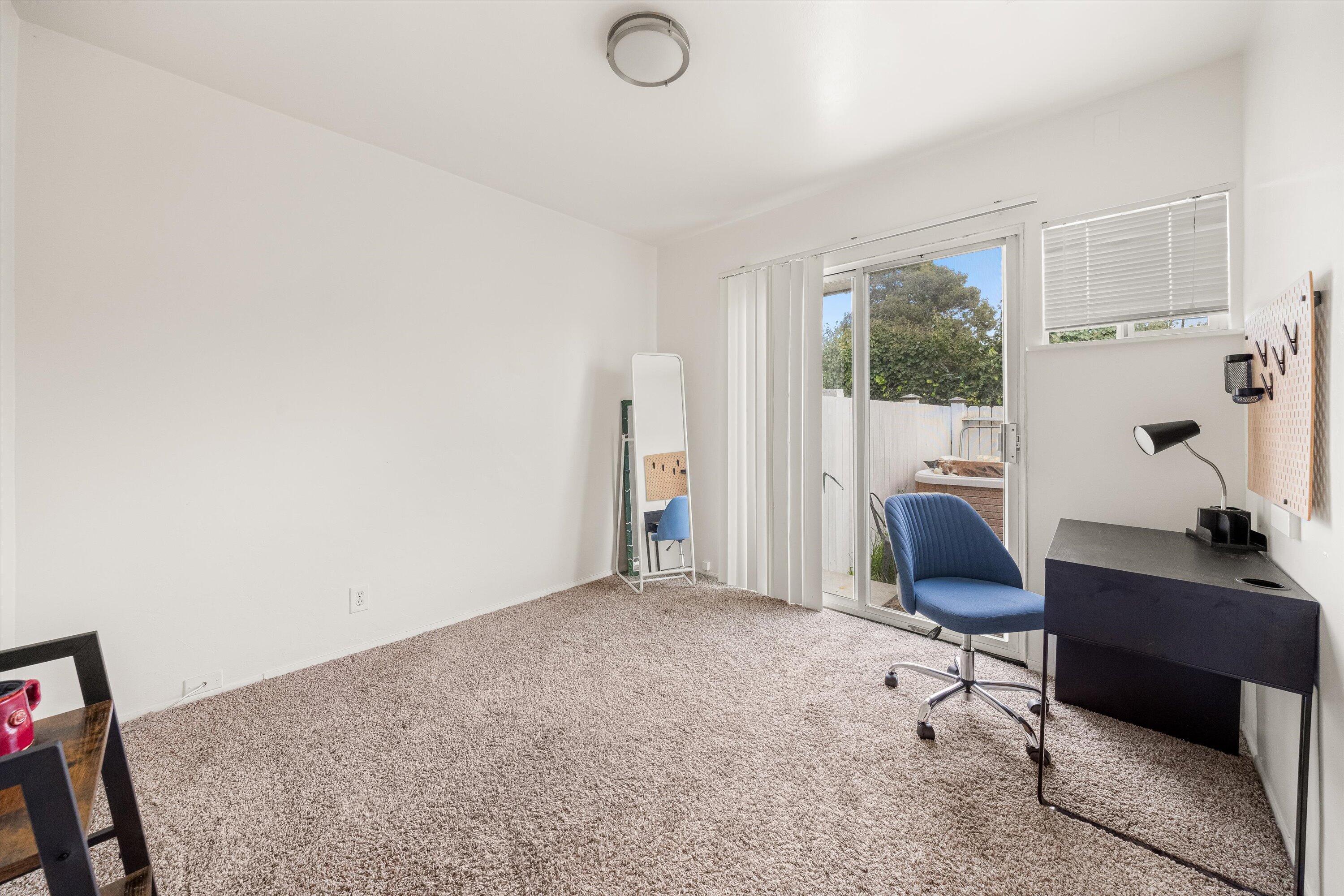6670 Sueno Road Isla Vista, CA 93117 - Photo 11 of 20 a workspace with furniture and a window