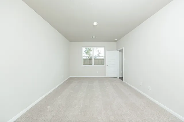 an empty room with window