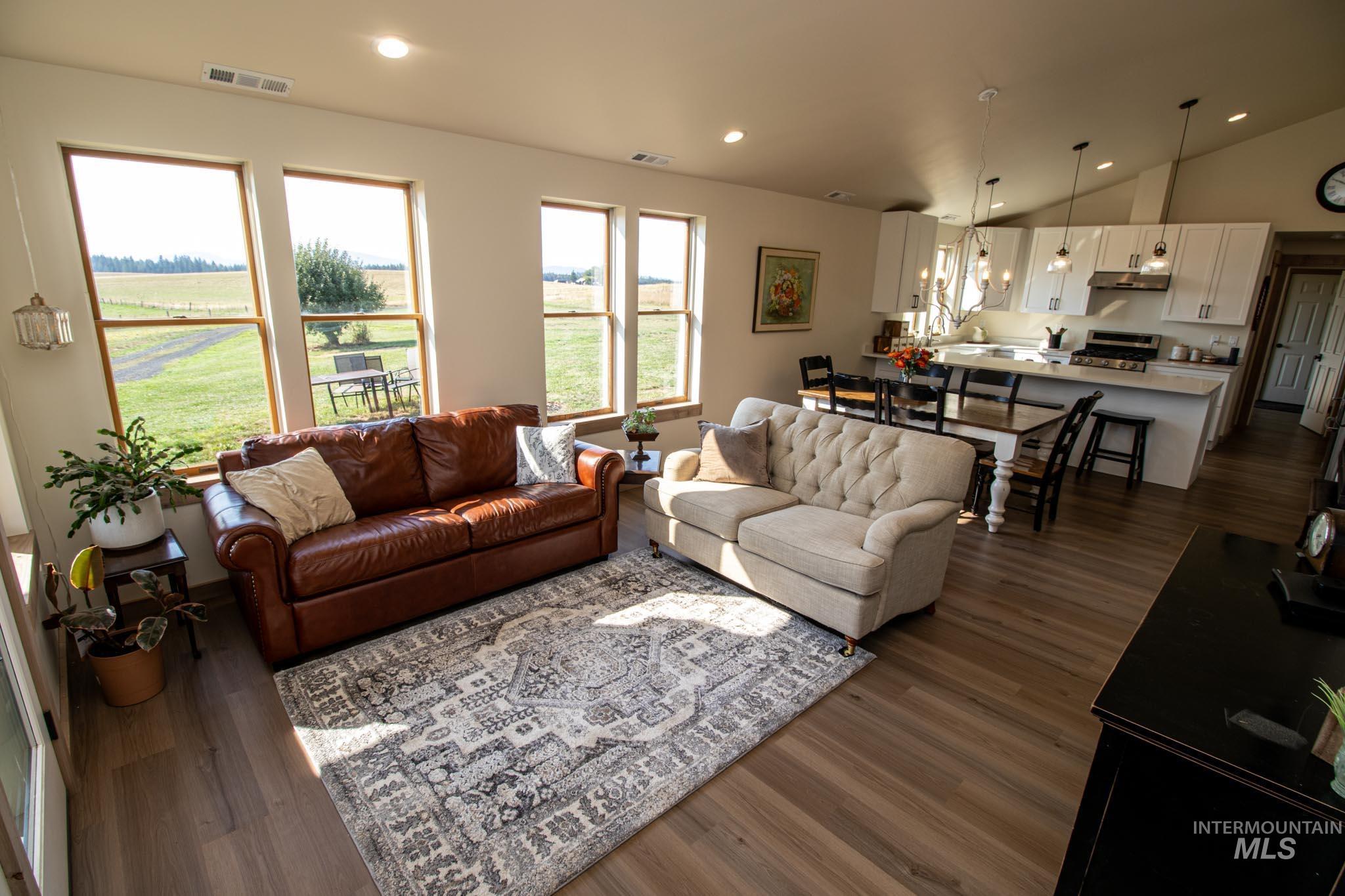 263 Glory Lane Orofino, ID 83544 - Photo 6 of 48 Living area featuring recessed lighting, lofted ceiling, and dark wood finished floors