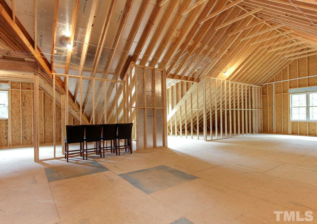 128 Chatterson Drive Raleigh, NC 27615 - Photo 22 of 25 a view of a patio with a table and chairs
