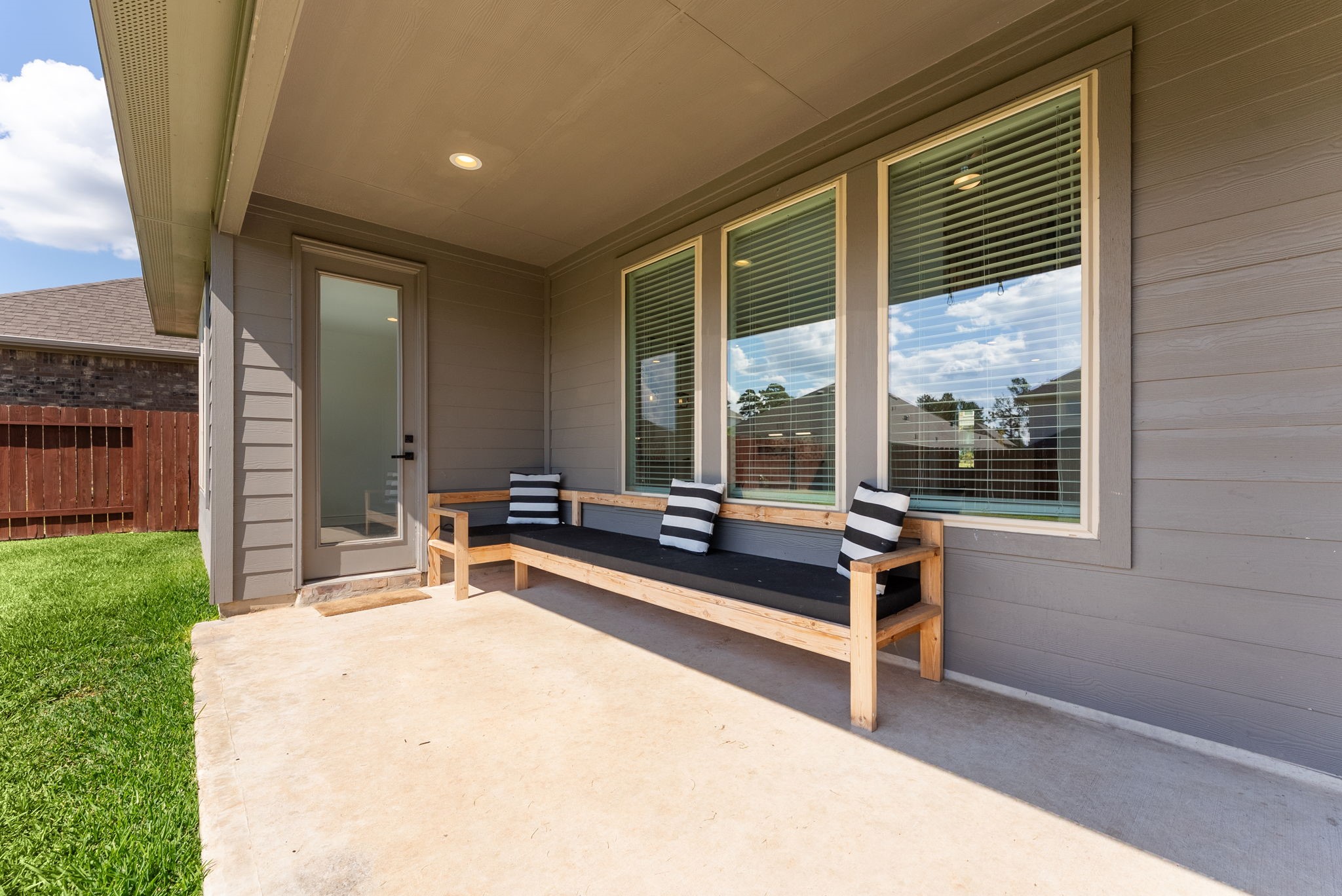 20151 Clear Rdg Lane Montgomery, TX 77316 - Photo 33 of 39 a building outdoor space with patio furniture and garden