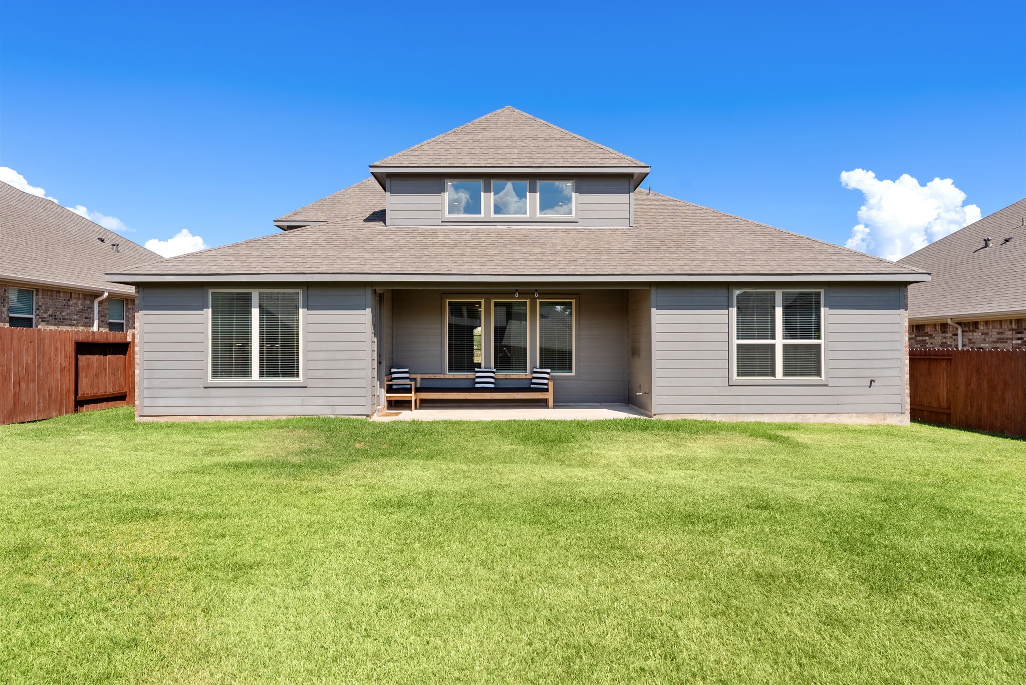 20151 Clear Rdg Lane Montgomery, TX 77316 - Photo 35 of 39 a front view of a house with a garden