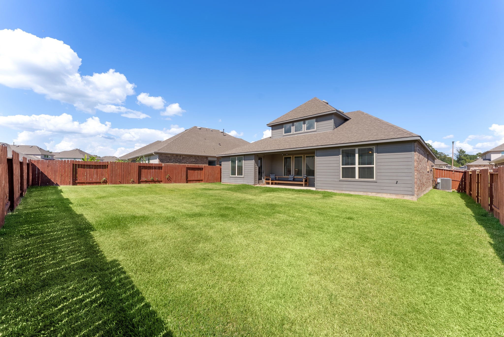 20151 Clear Rdg Lane Montgomery, TX 77316 - Photo 36 of 39 a front view of house with yard and green space