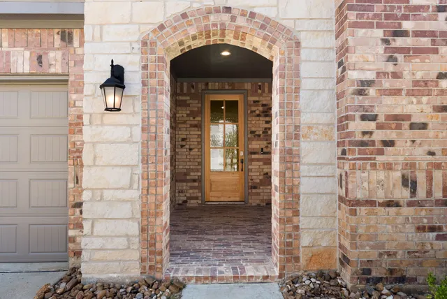 a front view of a house with a shower