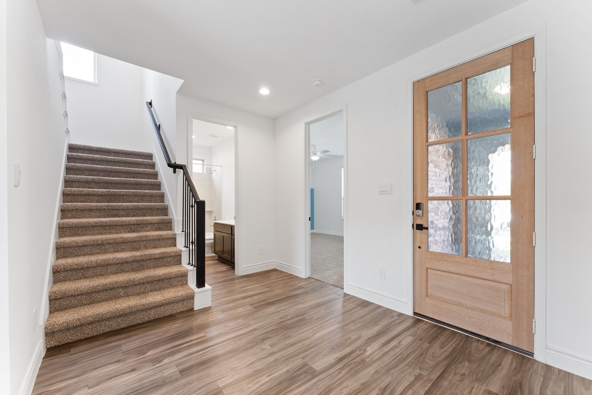20151 Clear Rdg Lane Montgomery, TX 77316 - Photo 5 of 39 a view of wooden floor and windows in a room