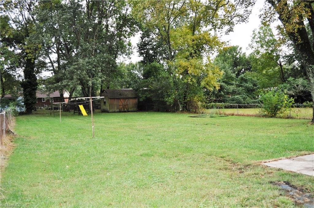 1411 West Meadowview Road Greensboro, NC 27403 - Photo 15 of 18 Fenced Backyard