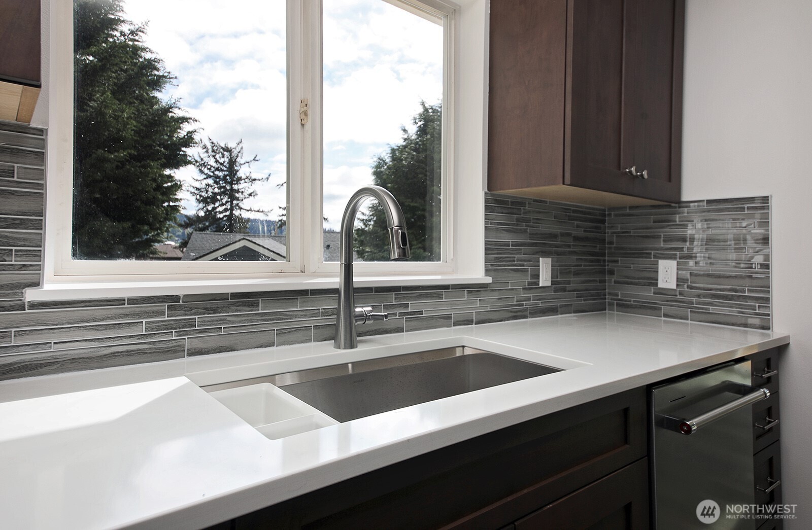3760 Periwinkle Road Clinton, WA 98236 - Photo 12 of 34 a kitchen with a sink and a window