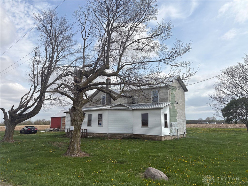 9006 Oakes Road Arcanum, OH 45304 - Photo 6 of 29 This charming home features a mix of construction materials and a spacious yard.