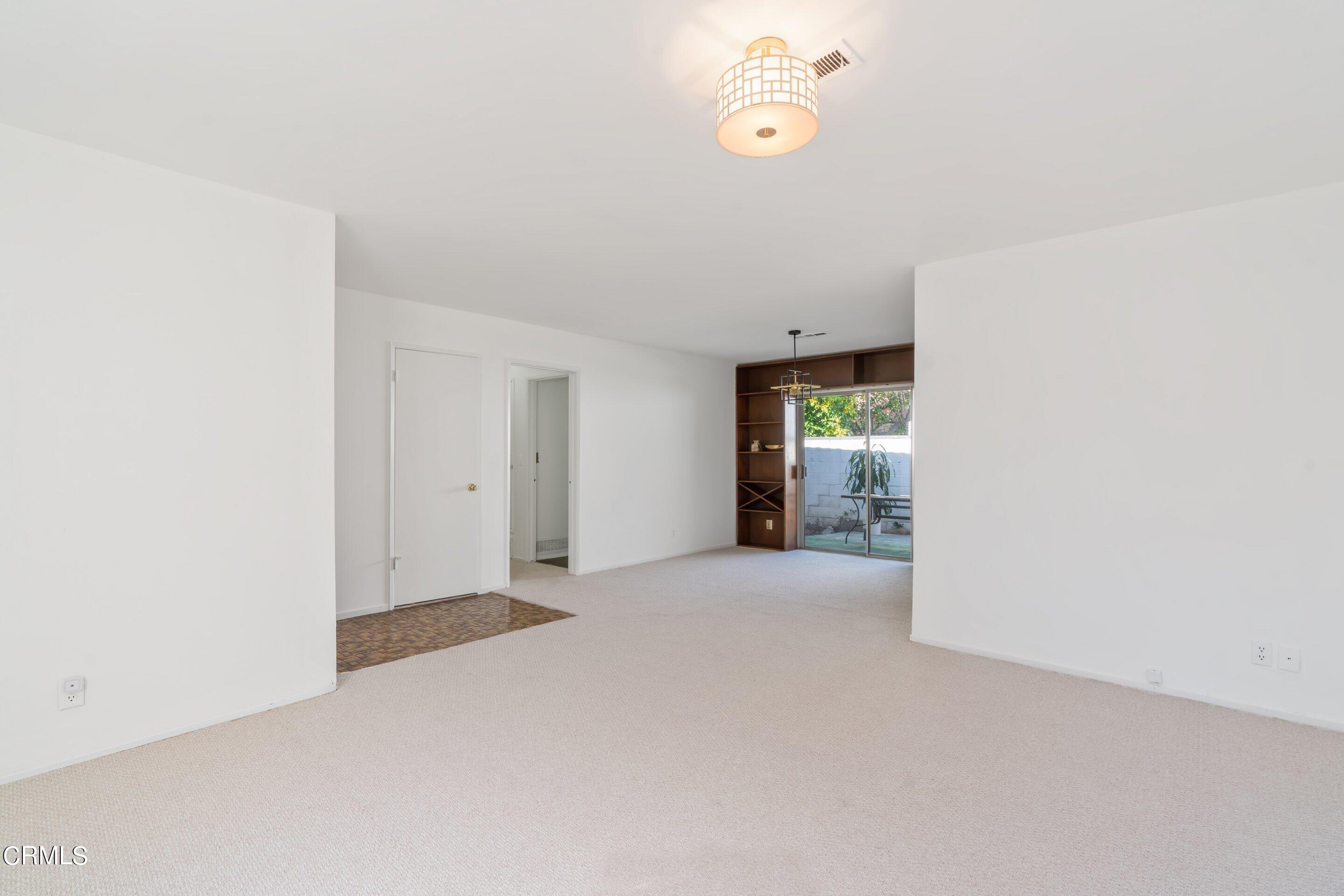 575 Winona Way Pasadena, CA 91103 - Photo 11 of 36 a view of an empty room with a window