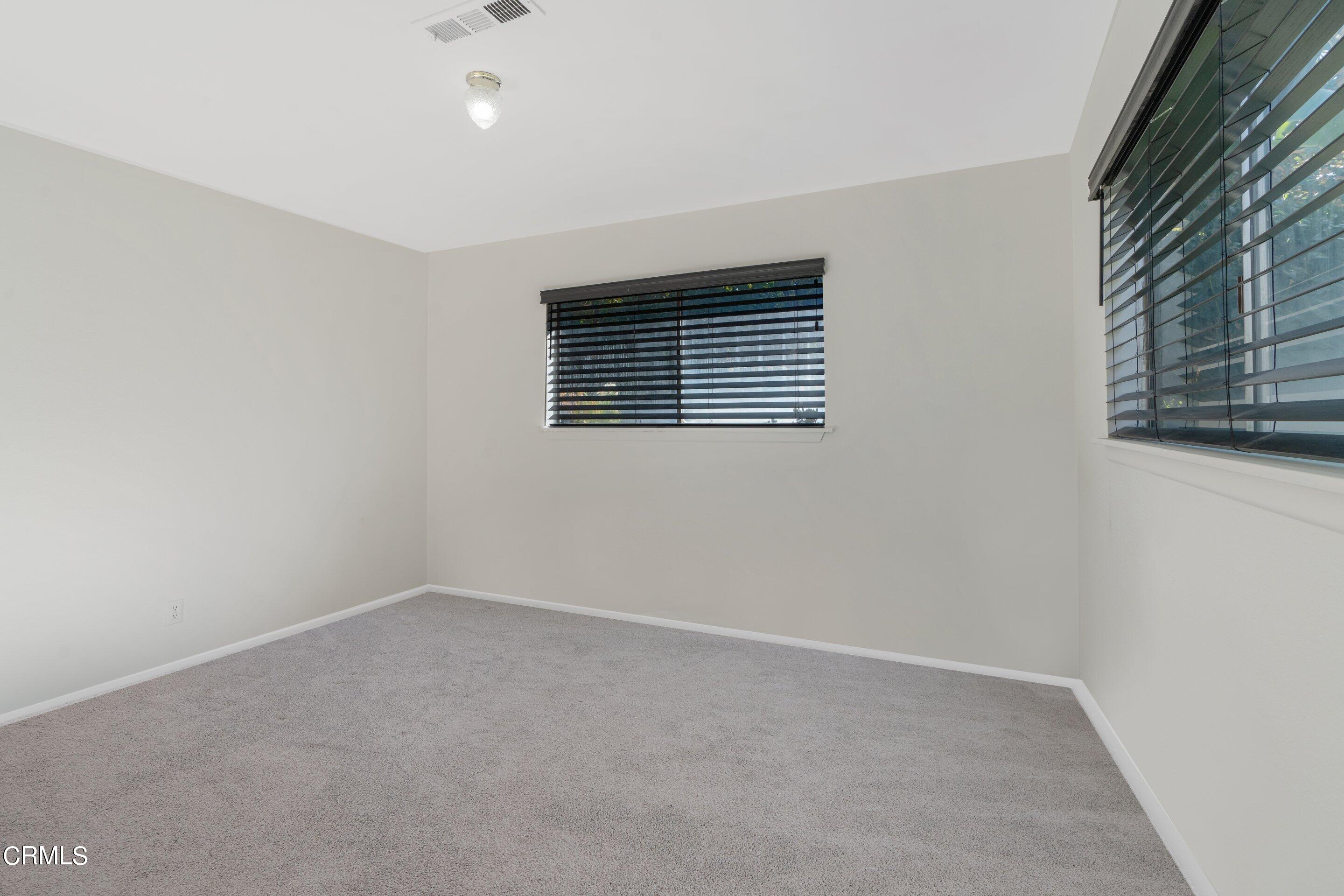 575 Winona Way Pasadena, CA 91103 - Photo 26 of 36 a view of an empty room with a window