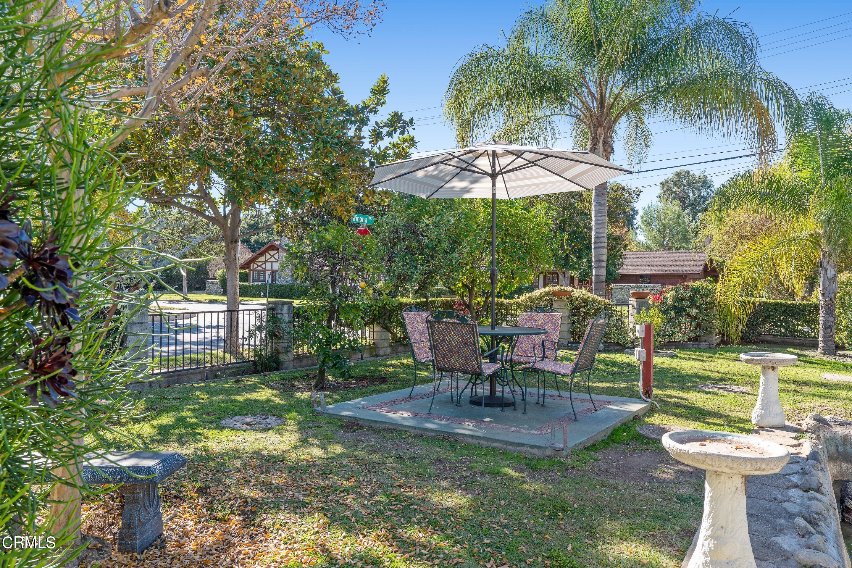 575 Winona Way Pasadena, CA 91103 - Photo 33 of 36 a view of a chairs and table in the patio